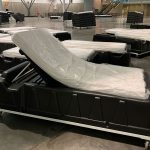 Trienda hospital beds wrapped in plastic