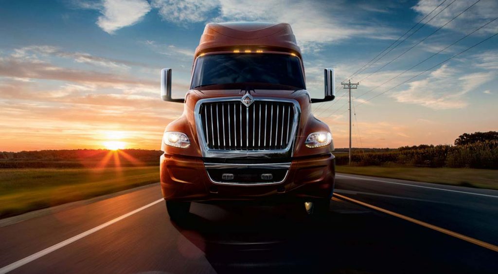 semi truck driving on highway