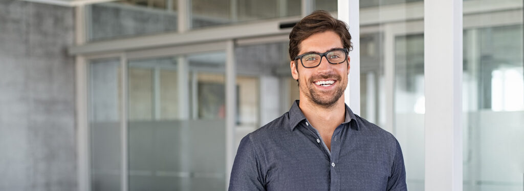 man smiling in office