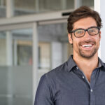 man smiling in office
